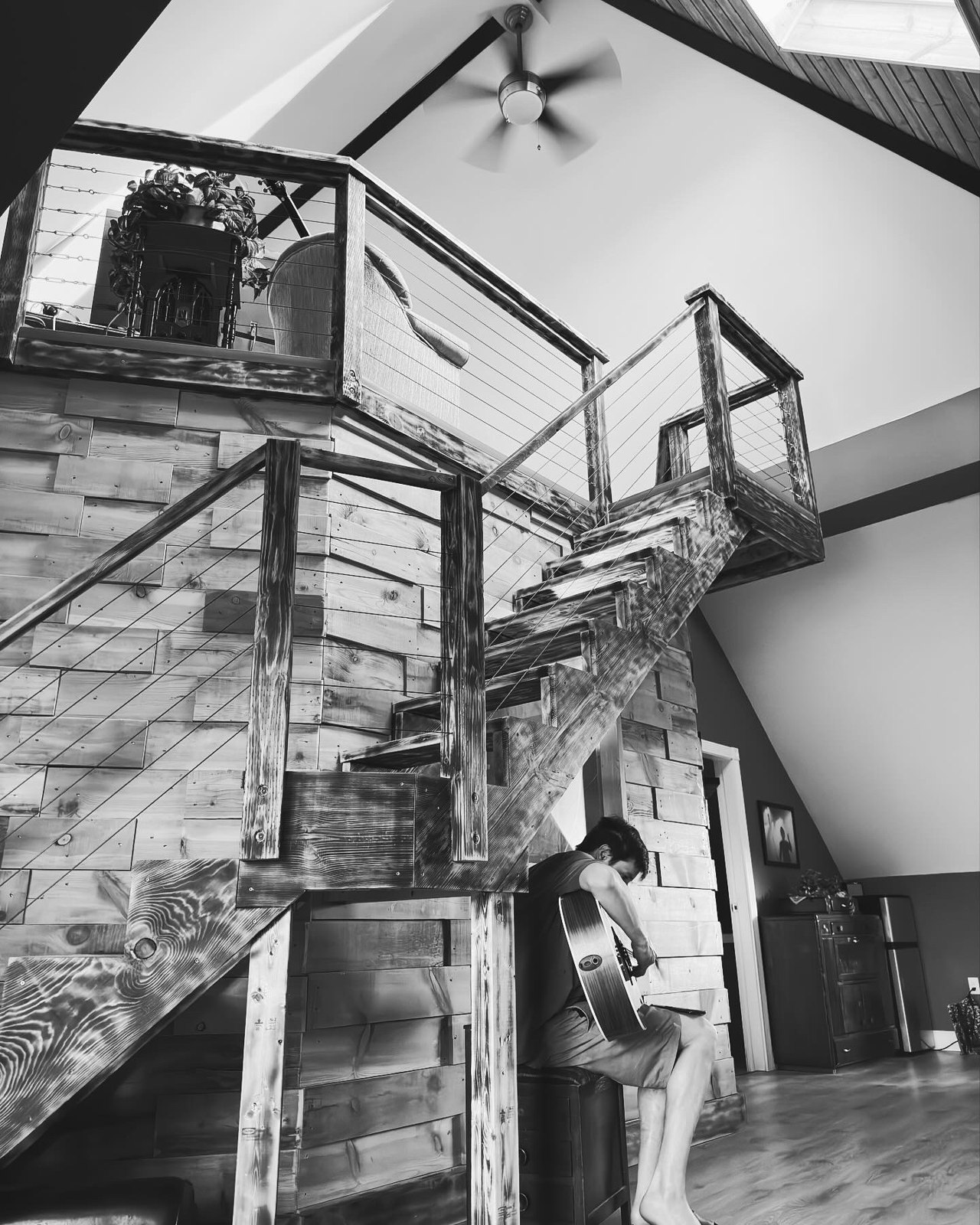 Custom-built staircase with cable railing